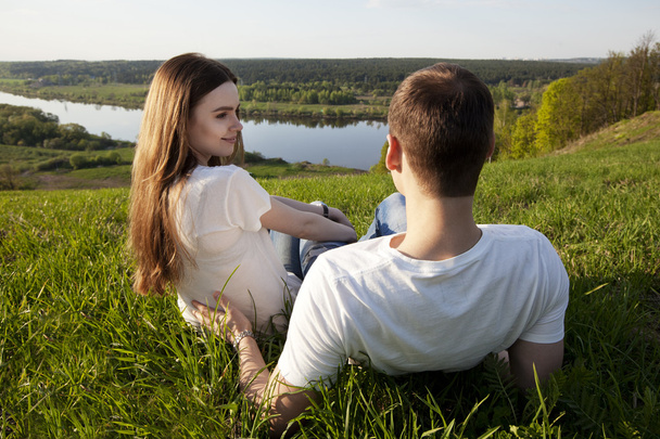 Loving couple relaxing on the nature - Фото, зображення