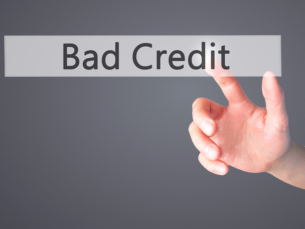 Bad Credit - Ручное нажатие кнопки на размытом фоне концепции
 - Фото, изображение