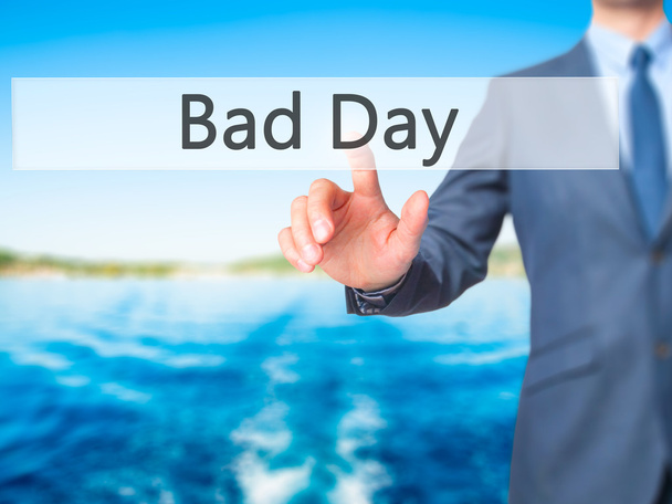 Bad Day - üzletember kézzel nyomógomb a érint képernyő többek - Fotó, kép