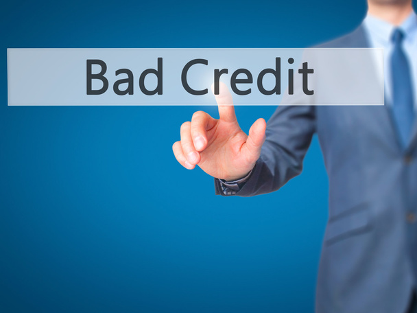 Bad Credit - Businessman нажимает кнопку на сенсорном экране
 - Фото, изображение