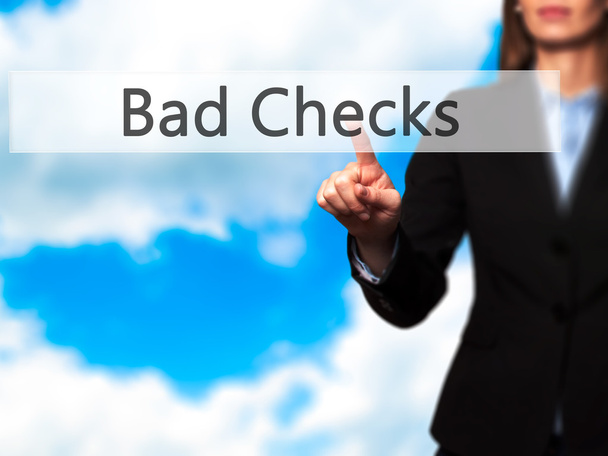 Bad Checks - Businesswoman hand pressing button on touch screen  - Photo, Image