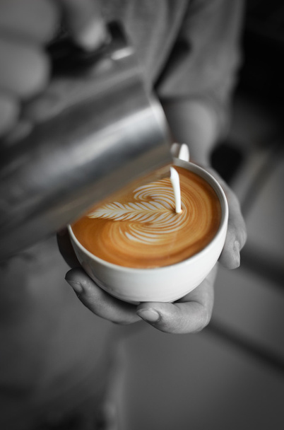 coffee latte art in coffee shop vintage color tone - Foto, Imagem