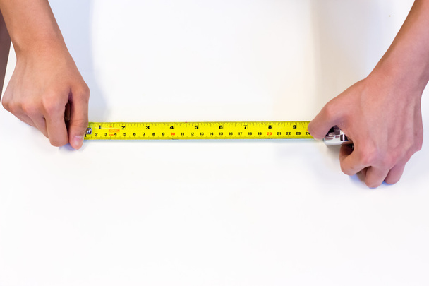 tape-measure in hand - Photo, Image