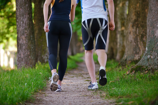 Young couple jogging - 写真・画像