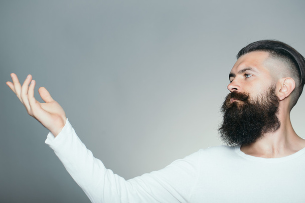 Bearded man with raised hand - Fotoğraf, Görsel