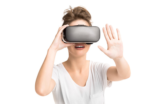 Girl getting experience using VR glasses of virtual reality - Zdjęcie, obraz