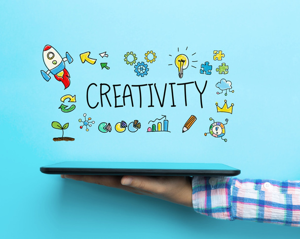 Creativity concept with a tablet - Foto, imagen
