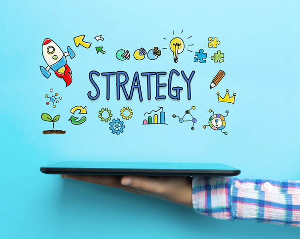 Strategy concept with a tablet - Foto, Imagen