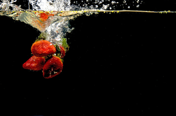 Photo of a fruits dropped under water - Fotó, kép