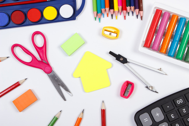 School accessories and shape of building on white background, back to school concept - Foto, Imagen
