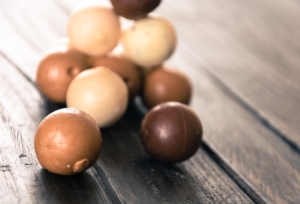 chocolate ball  on wood - Foto, imagen