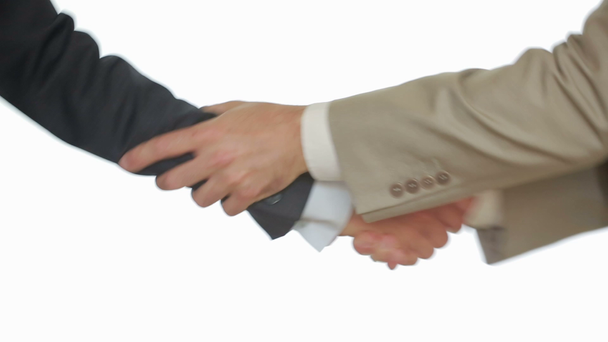 A Business Handshake with White Background, Two men shake hands - Footage, Video