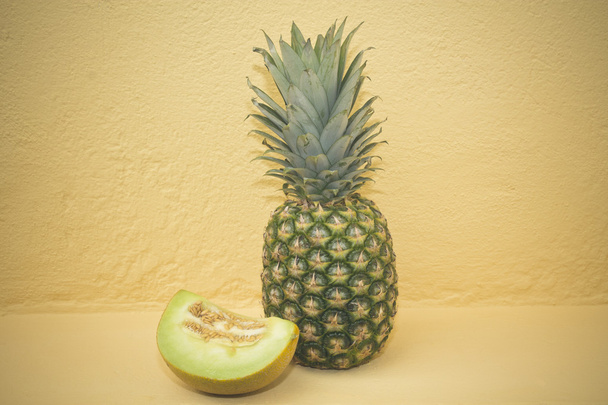 fruit, pineapple over yellow background - Фото, зображення
