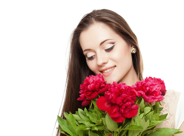 Portrait of a beautiful girl with flowers on white background - Zdjęcie, obraz