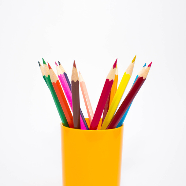 Colored pencils on white background. - Fotó, kép