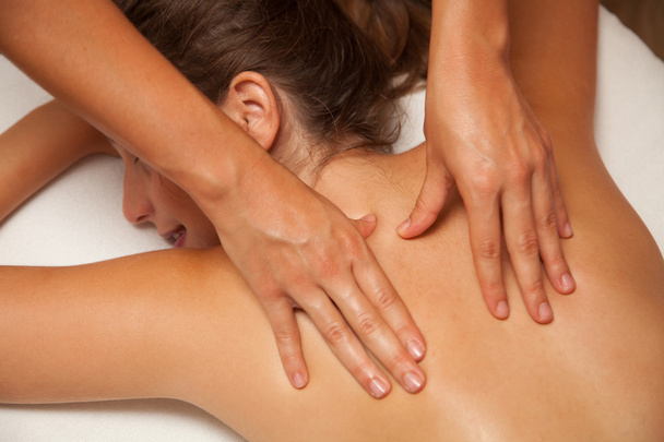 Woman receiving a masage - Φωτογραφία, εικόνα