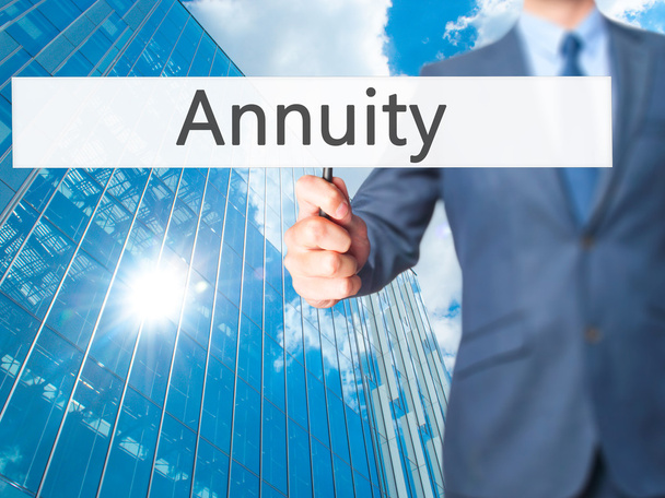 Annuity - Business man showing sign - Photo, Image