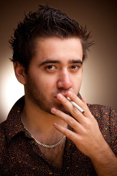 Funny portrait of man with a cigarette - Фото, зображення