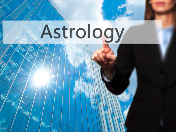 Astrologie - isolierte weibliche Hand, die Knopf berührt oder auf Knopf zeigt - Foto, Bild