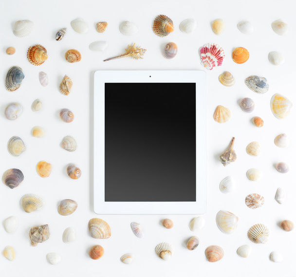 Tablet and Seashells Mock up - Foto, Bild