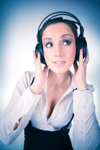 Young woman with big headphones - Foto, imagen