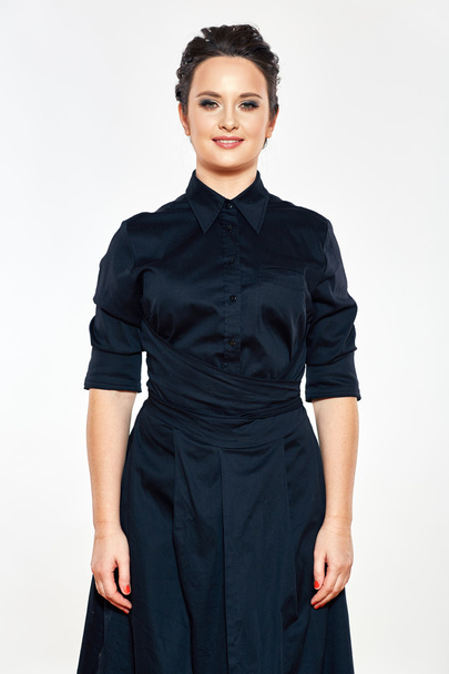 business woman in black dress - Foto, afbeelding