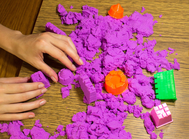 The female hands with kinetic sand - Photo, Image