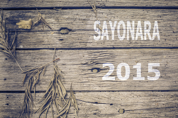 Sayonara 2015 sobre fondo de madera vieja
 - Foto, imagen
