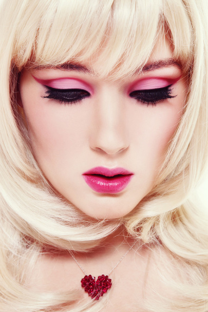 Blonde girl with fancy make-up - Photo, image