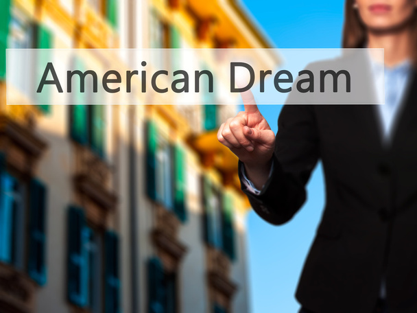 Αμερικανικό όνειρο - απομονωμένη γυναικείο χέρι αγγίζει ή επισημαίνοντας bu - Φωτογραφία, εικόνα
