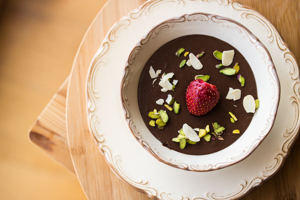 Chocolate pudding with strawberry / homemade - Фото, изображение