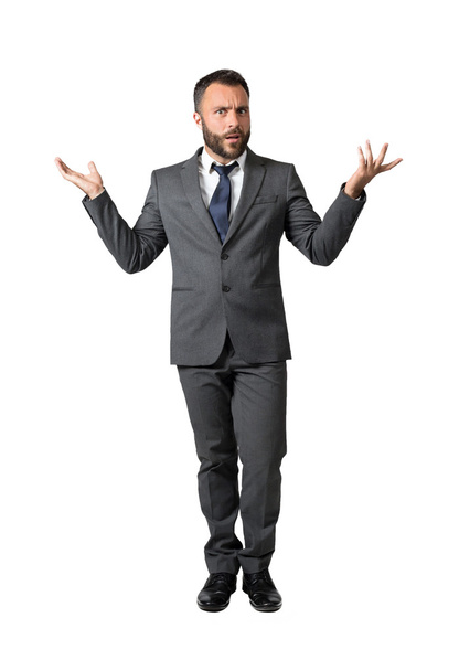 Embarrassed emotional businessman isolated on white - Фото, зображення
