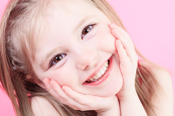 cute fashion little doll girl in pink background - Valokuva, kuva