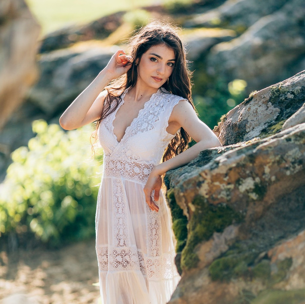 Young woman in white dress outdoors  - Photo, Image