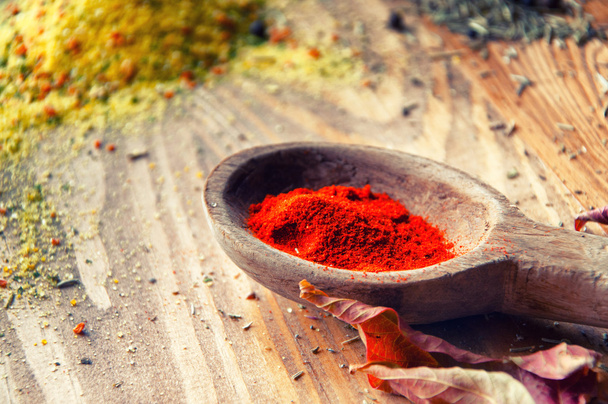 Spices on a wooden background - Photo, Image