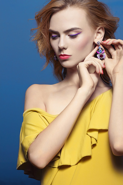 woman wearing jewelery earrings - Photo, Image