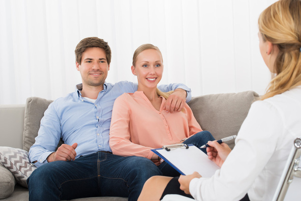 Young Couple Consulting With Psychologist - Photo, image