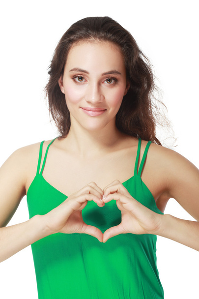 woman showing heart gesture - Photo, Image
