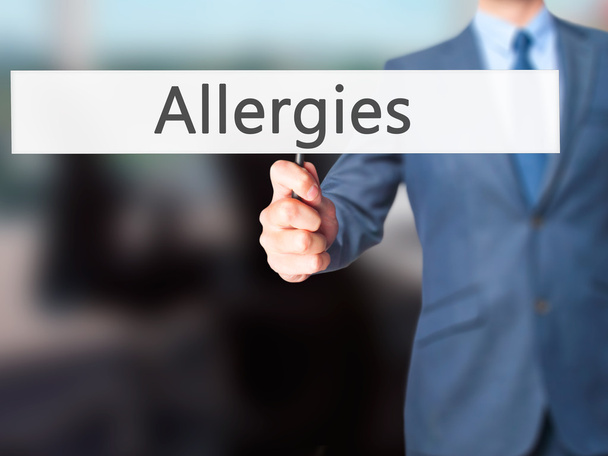Allergie - Segno di tenuta della mano dell'uomo d'affari
 - Foto, immagini