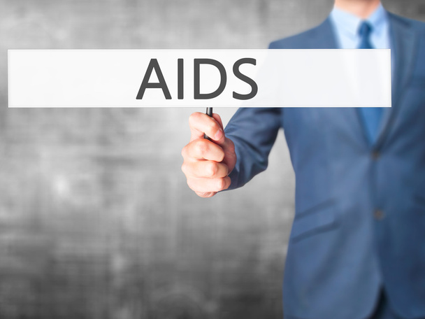 AIDS - üzletember kezében jele - Fotó, kép