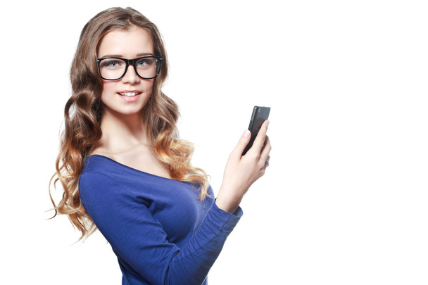 smiling young woman with mobile phone - Foto, imagen