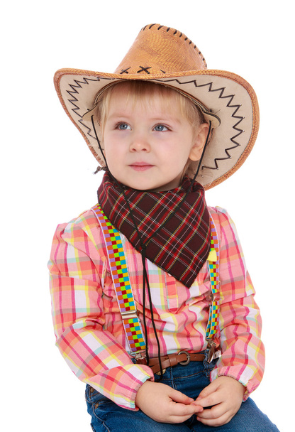 Pieni tyttö pukeutunut cowboy
 - Valokuva, kuva