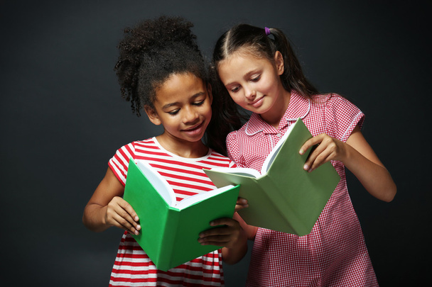 Cute girls reading book - Foto, immagini