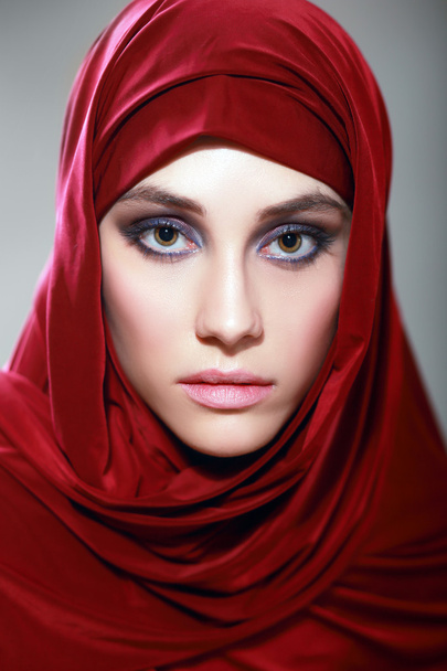 Arabic woman wearing red scarf - Φωτογραφία, εικόνα