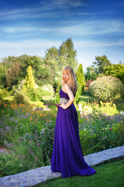Portrait of woman dressed in evening gown - Photo, Image