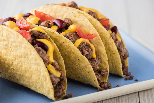 Mexican tacos with beef, cheddar cheese, tomato - Photo, Image