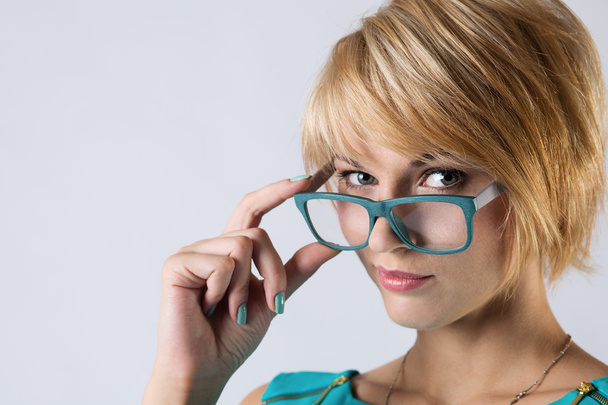 Beautiful business woman with glasses. Close-up portrait - Foto, Imagen