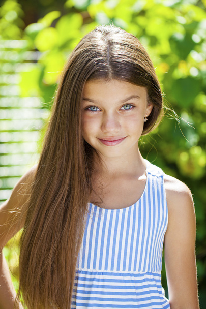 Portrait of a beautiful young little girl  - Fotó, kép