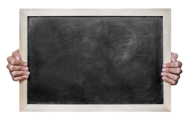 La main d'une femme tient un tableau noir vierge isolé sur fond blanc - Photo, image