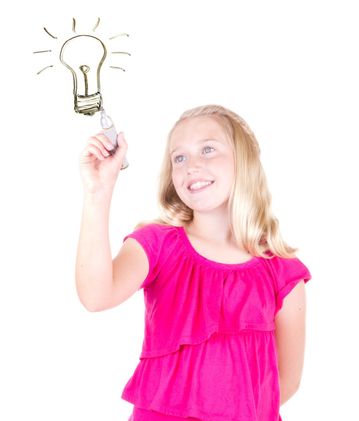 Girl with an idea drawing light bulb - Photo, Image